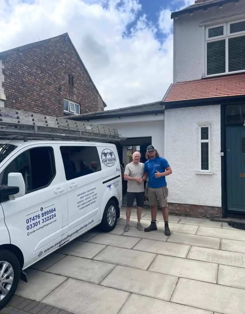 Rob and the team beside the ASAP Roofing van
