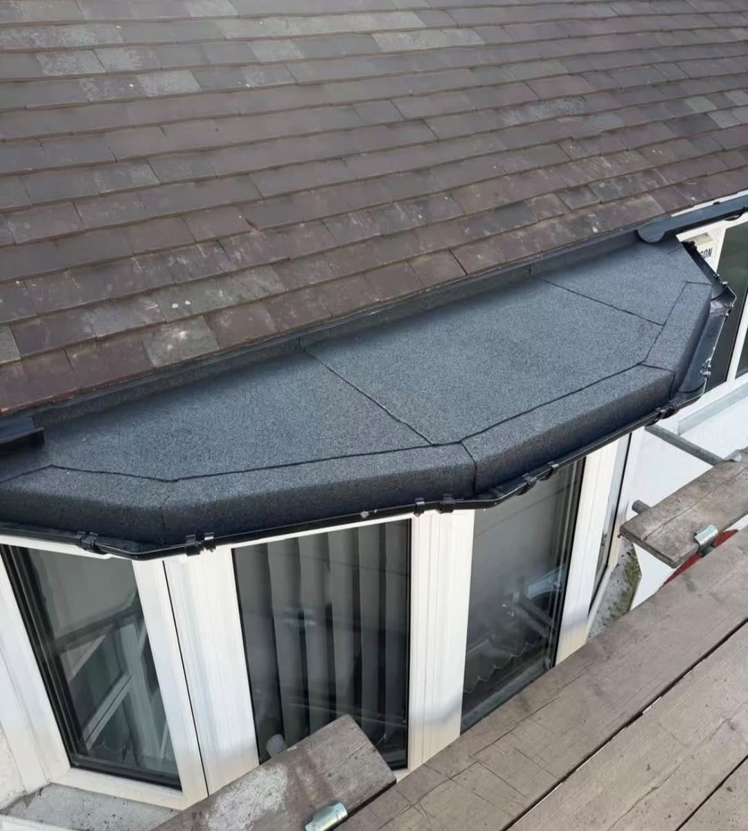 A bay window flat roof re-covered, with a new edge trim