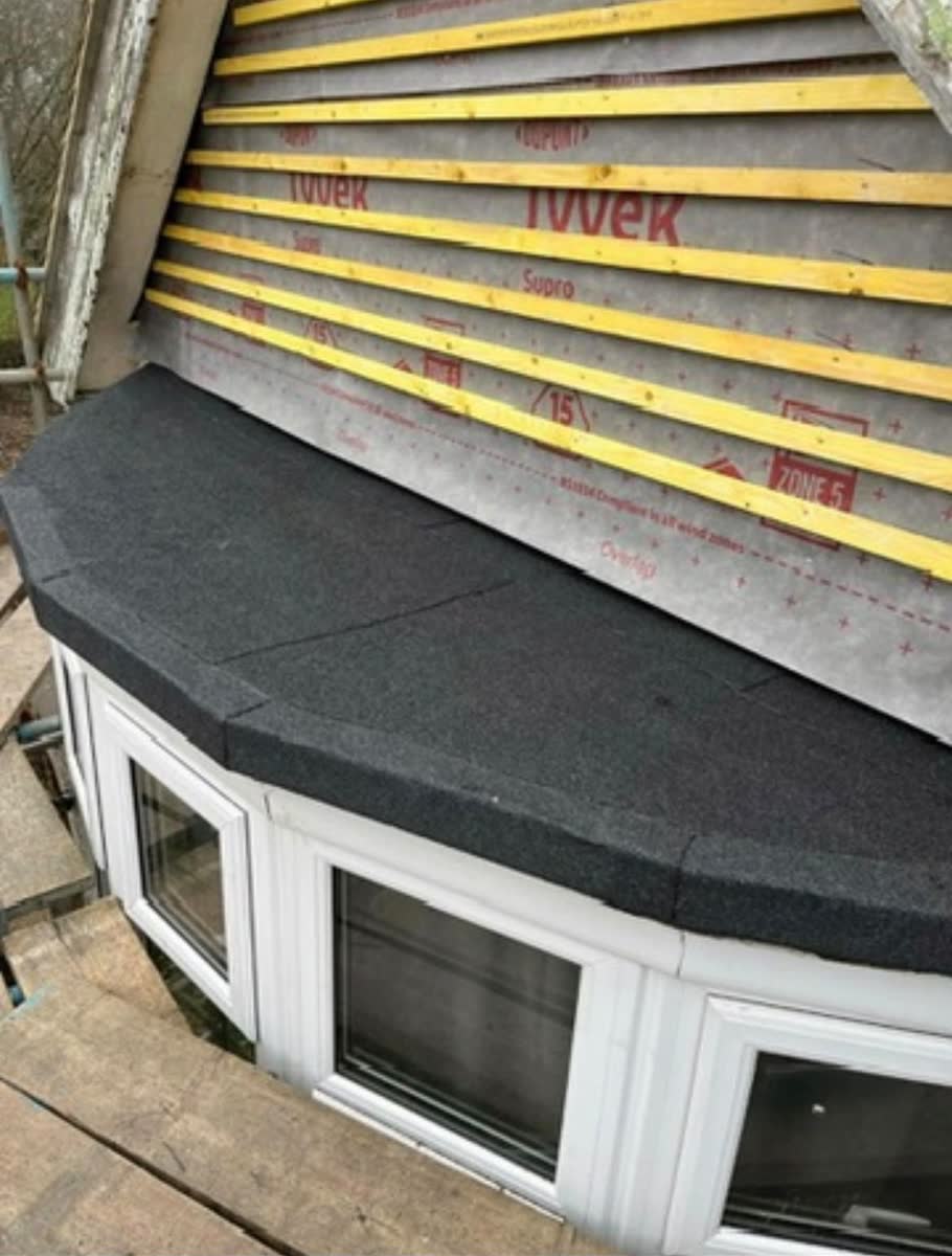 A bay window flat roof covered, with new battens and membrane on the roof above