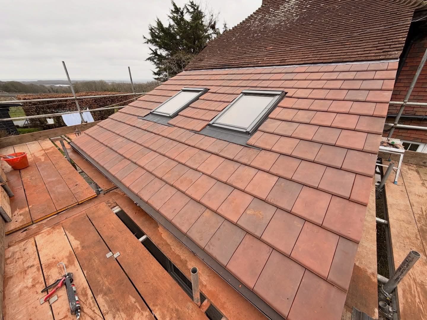 New tiled roof with two rooflights fitted
