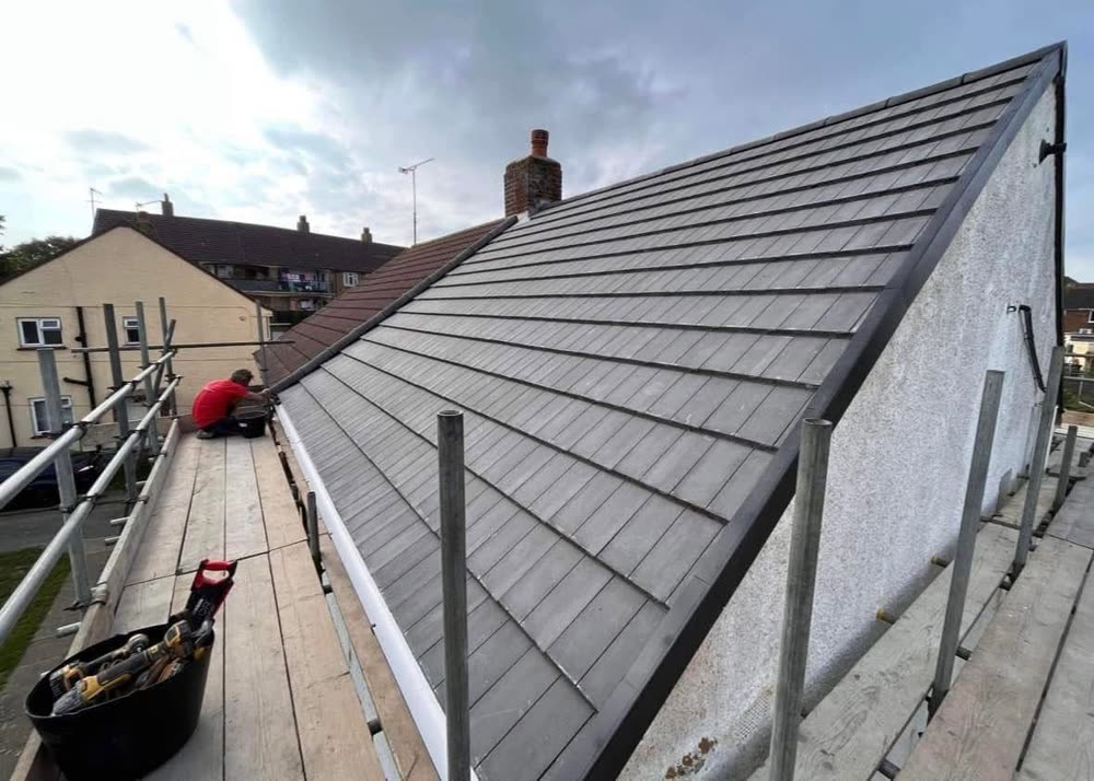 Grey tiled gable roof just completed